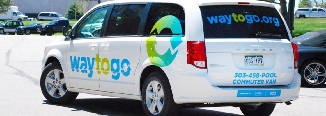 A white van branded with Way to Go's logo.