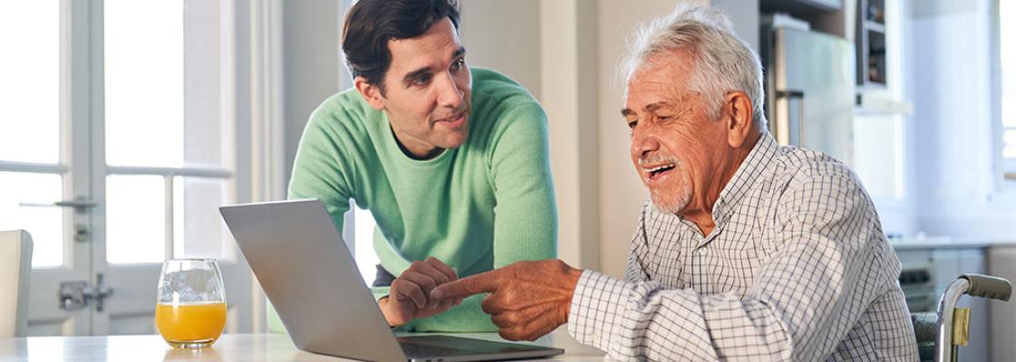 Older adult man with grandson. 
