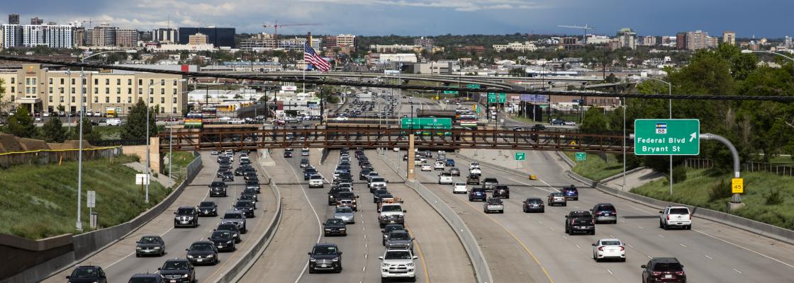 Vehicles traveling on a busy highway.